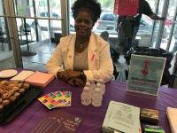 Lauren Medley staffs the HCADV Day table at Health Center 3